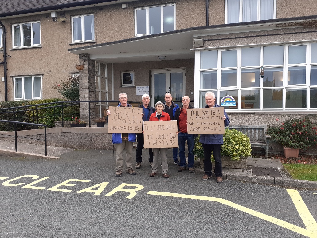 Kendal Labour Party members staging silent protest outside Maudes Meadow Care Home